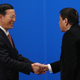 Sharing courtesies with Chinese vice-premier Zhang Gaoli.